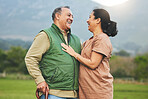 Nature, laughing and senior couple outdoor in with love, care and commitment to happy partner. Elderly man and a woman on a grass field or countryside for travel, adventure and retirement vacation