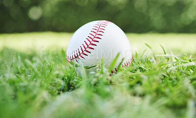 Buy stock photo Baseball, sports and recreation with a ball on the grass, closeup waiting for a game or competition. Earth, fitness and training with a softball on a lawn, pitch or grass for sport activity outdoor