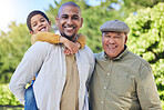Father, son and grandfather with generations in park portrait with piggy back, happiness or love on vacation. Men, boy child and hug with bond, excited family or outdoor in summer sunshine on holiday