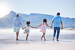 Back, holding hands and grandparents at the beach with children for holiday and walking by the sea. Content, summer and girl kids on a walk by the ocean with a senior man and woman for bonding