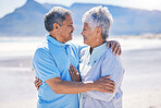 Senior couple, hug and sea vacation outdoor with love and romance in nature. Ocean, elderly and old woman and man together on summer holiday by the sea feeling happiness and relax on a beach