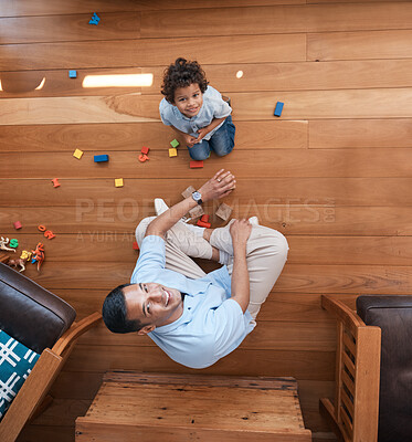Buy stock photo Portrait, toys and top view of father with kid on floor for playing, educational games and learning. Child development, family home and above of happy dad and young boy for fun, bonding and love
