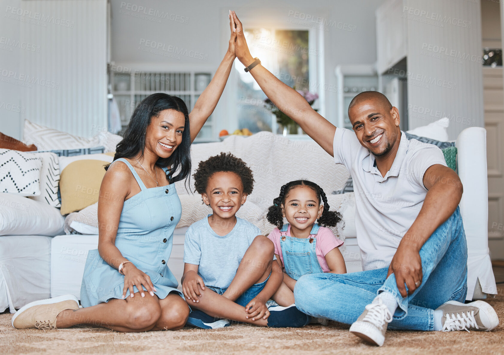Buy stock photo Security, family and portrait of parents and children on floor bonding, quality time and relax in living room. New home, insurance and happy mom, father and kids with smile, roof icon and happiness