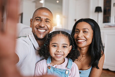 Buy stock photo Portrait, family and selfie smile in home living room, bonding and having fun. Photo, happiness and child with parents, care and taking face pictures for happy memory, social media or profile picture