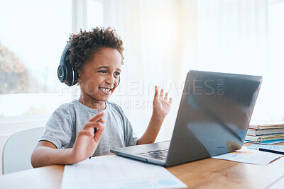 Buy stock photo Happy, remote and a child waving on a video call for education, elearning and online class on laptop. Smile, wave and a student greeting for digital school communication from home on a computer