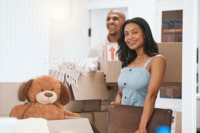 Buy stock photo Happy couple, real estate and moving in new home for renovation, property investment or relocation together. Man and woman realtor carrying boxes or luggage in the house with smile for mortgage loan