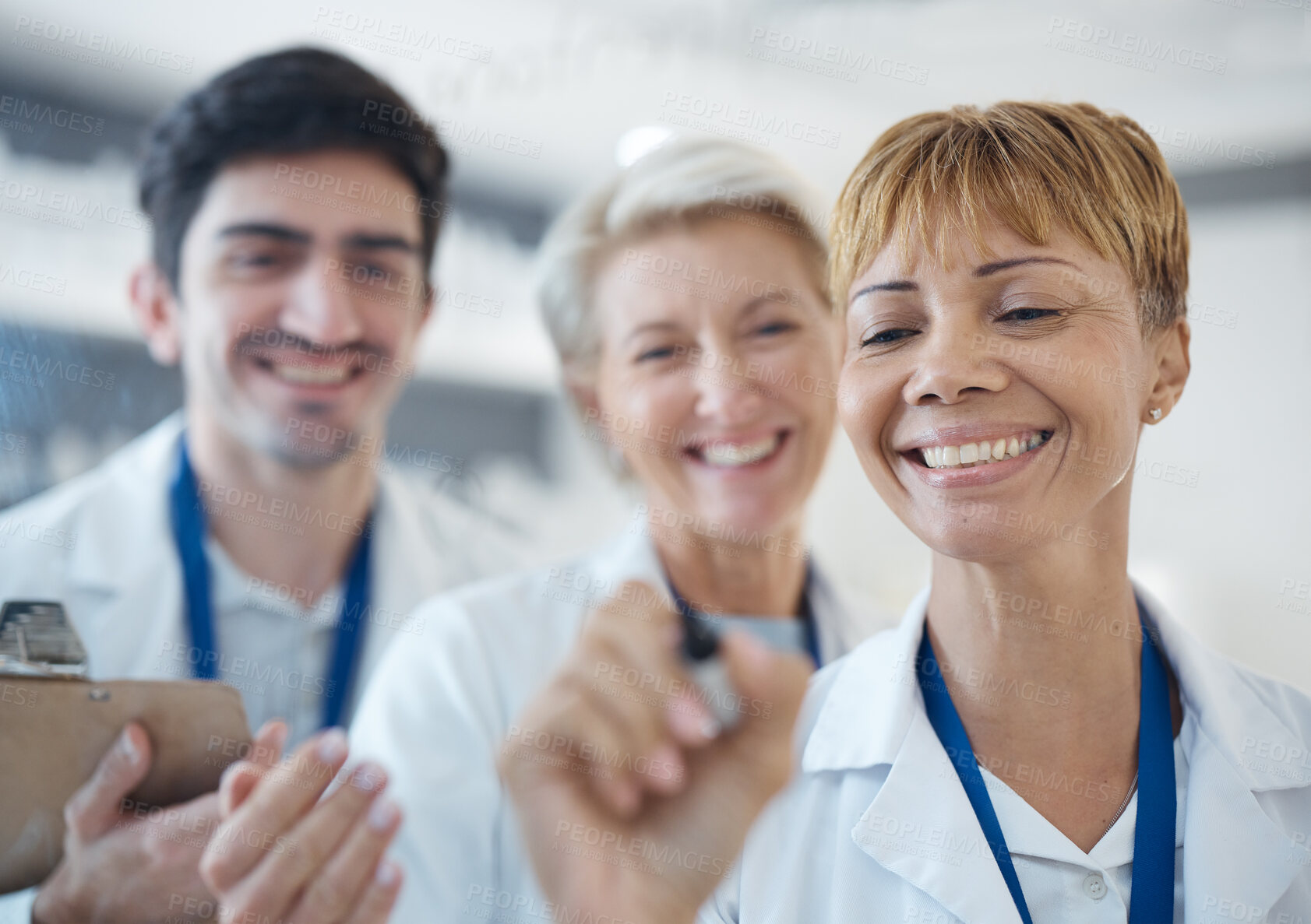 Buy stock photo Doctor, happy team and writing healthcare strategy for schedule planning or brainstorming together at hospital. Group of doctors smile in meeting, collaboration or teamwork for medical tasks or plan