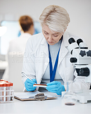 Buy stock photo Science woman, blood test and medical analysis in laboratory for scientist investigation or research. Person writing dna results, sample or study in lab for biotechnology innovation or development