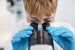Woman, science microscope and medical analysis in a laboratory for investigation or research. Scientist person in a lab with a face mask for future medicine, biotechnology innovation or development