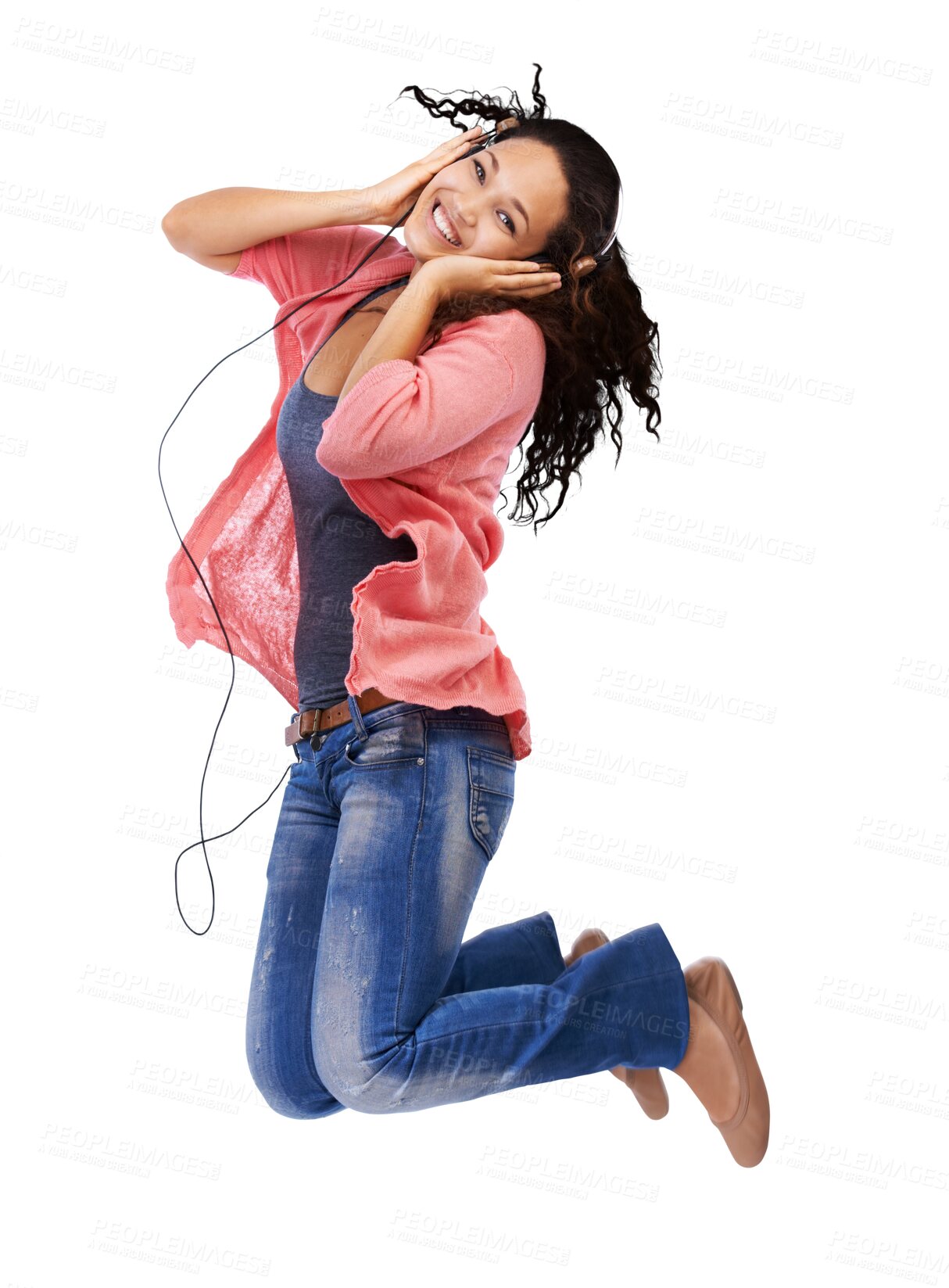 Buy stock photo Portrait, headphones and portrait of woman jumping isolated on transparent, png background for energy, dancing and radio. Happy biracial person dance in air and listening to music on audio technology