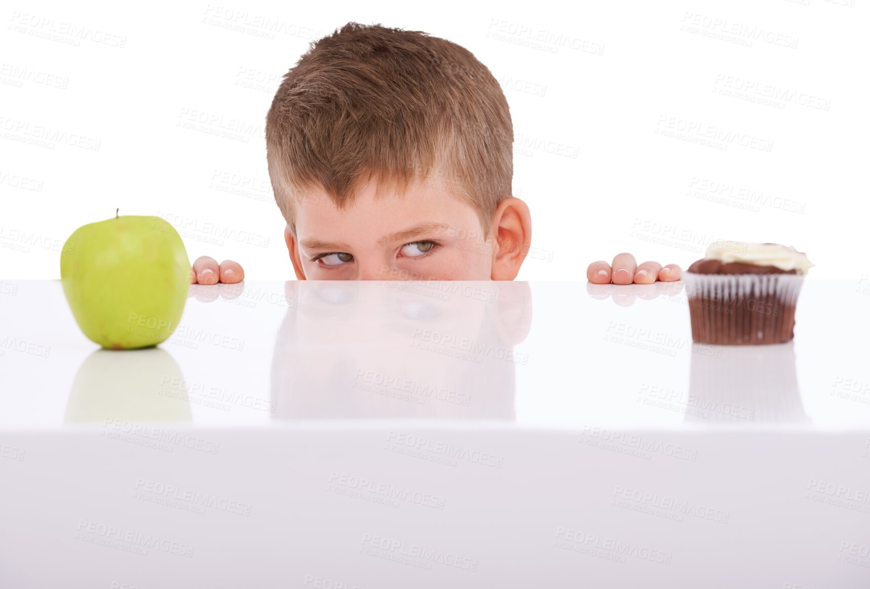 Buy stock photo Choice, decision and child with apple and cupcake on isolated, png and transparent background. Childhood, healthy eating and young boy with fruit, cake and candy to choose dessert, luxury and treats