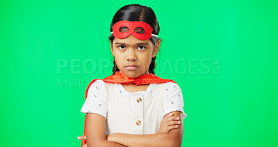 Buy stock photo Portrait, angry and a superhero girl child on a green screen background looking serious about crime fighting. Frown, arms crossed and a young female kid feeling upset in a costume for fantasy