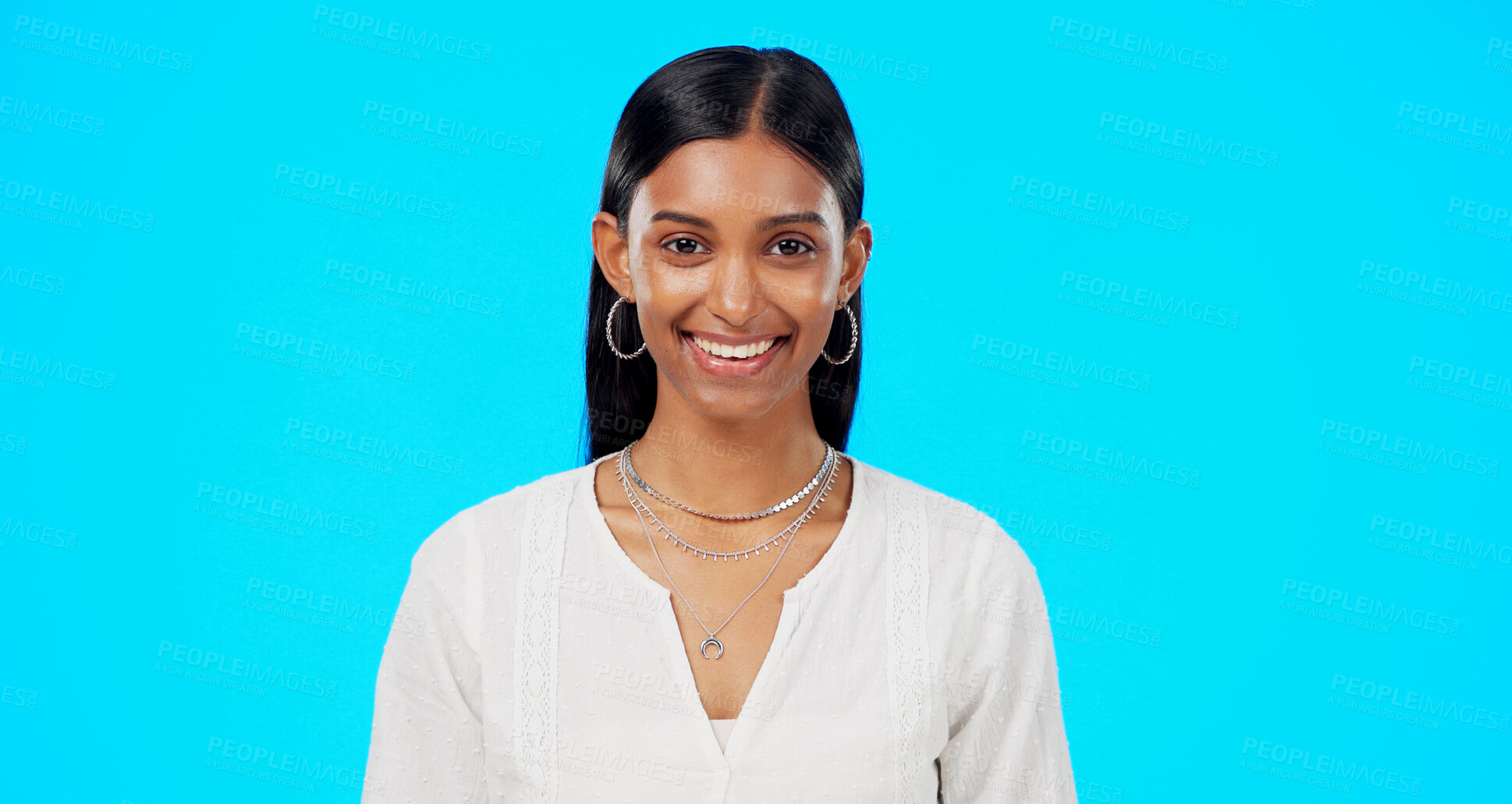 Buy stock photo Smile, business and portrait of Indian woman in studio happy for career, job and work opportunity. Professional, confidence and face of isolated person on blue background with pride, ambition and joy