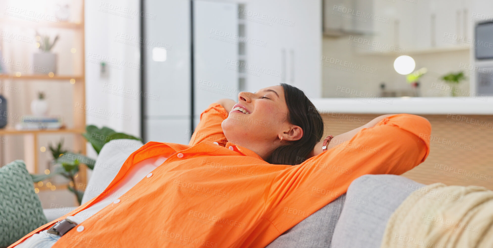 Buy stock photo Relax, calm and woman on a sofa in the living room of modern apartment on weekend morning. Happy, rest and young female person from Canada laying, dreaming and chilling in the lounge of her home.