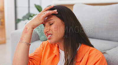 Woman, headache and pain in home with stress, dizzy mind and mental health crisis. Sick female with migraine, tension and anxiety in brain of burnout, medical problems and frustrated face in lounge
