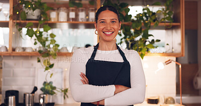 Face, woman and barista with arms crossed, smile and confidence in store, success and waitress in cafe. Portrait, female employee or lady with happiness, entrepreneur or business owner in coffee shop