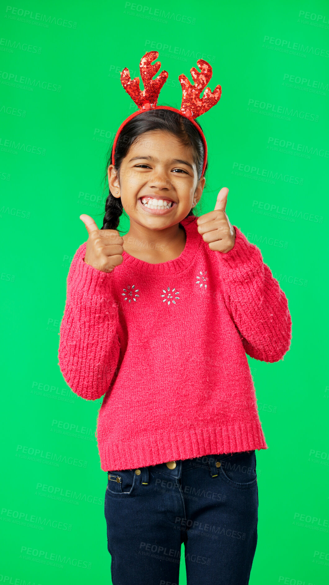 Buy stock photo Green screen, Christmas and thumbs up by child happy for holiday isolated in a studio background and excited. Smile, thank you and kid or girl in celebration with okay sign, symbol or hand gesture