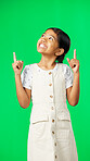 Face, pointing and girl with motivation, green screen and choice with inspiration, happiness and show. Portrait, female child and young person with direction, decision and promotion with joy or smile