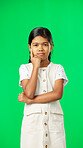 Girl, child and thinking of idea on green screen background with mockup space for plan or choice. Indian kid portrait in vertical studio with hand on chin planning, think or brainstoming decision