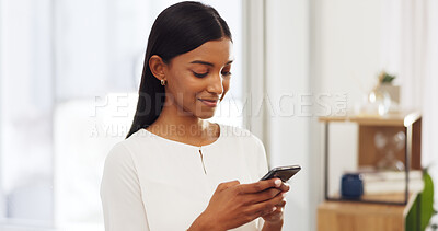 Buy stock photo Happy woman in office with phone, reading email or social media, networking and connection. Online communication, internet search or chat, girl with smile and cellphone with mobile app for blog post.