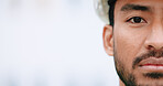 Face of construction manager wearing hardhat while standing outside on site with copy space. Closeup of civil engineer worker doing maintenance and repair work for building project