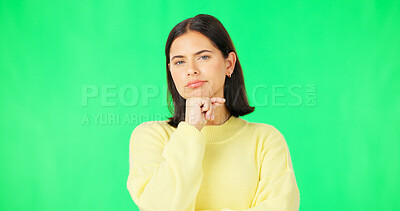 Buy stock photo Face, thinking and doubt with a woman on a green screen background in studio to decide her options. Idea, mind and mockup with a young female model looking thoughtful on chromakey for a choice