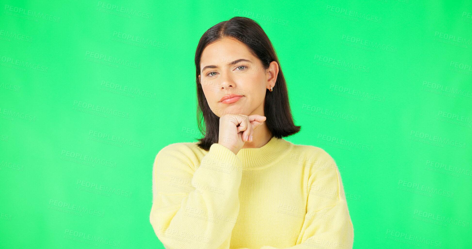 Buy stock photo Face, thinking and doubt with a woman on a green screen background in studio to decide her options. Idea, mind and mockup with a young female model looking thoughtful on chromakey for a choice