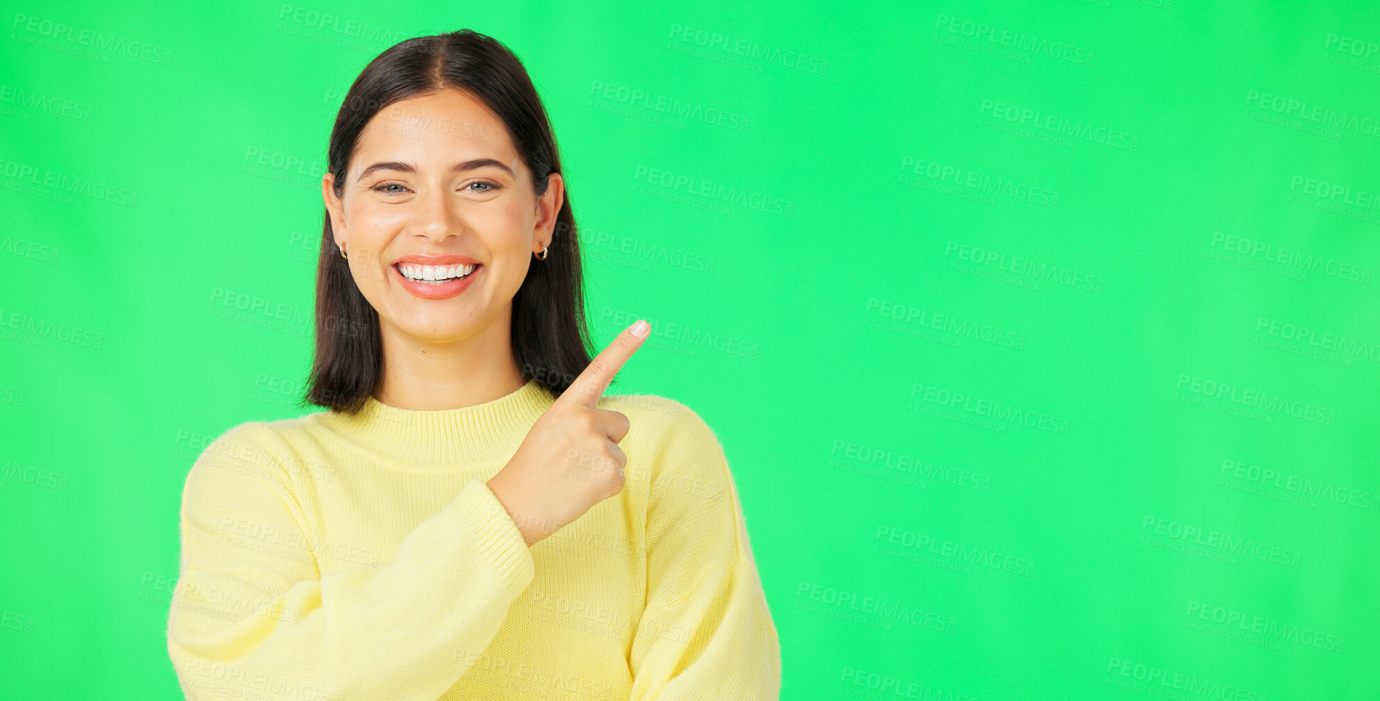 Buy stock photo Portrait, woman and pointing on green screen for advertising information, deal and promotion on studio background. Happy model show presentation of mockup, feedback and announcement of news about us