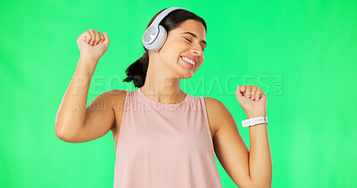Buy stock photo Woman, dance and headphones with music on green screen and studio background with freedom or tech. Audio, listening and happy girl streaming radio, media or dancing to hip hop, album or sound