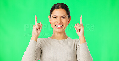 Buy stock photo Happy woman, portrait and pointing up with smile in studio on green background with mock up for presentation. Person, employee or entrepreneur with gesture in excitement for product, offer or deal