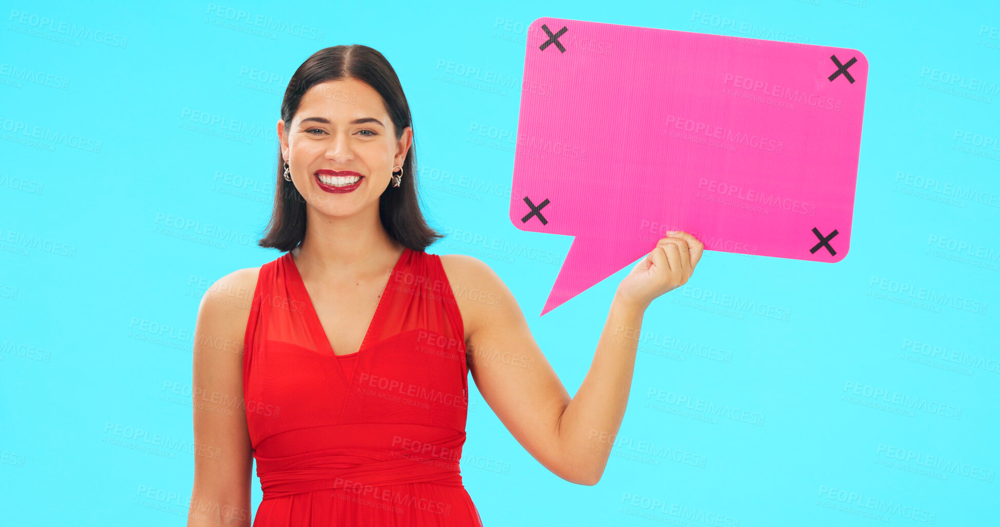 Buy stock photo Woman, speech bubble and smile in studio portrait, mockup and feedback for valentines day by blue background. Girl, cardboard sign and poster with tracking markers for love, romance or quote on promo