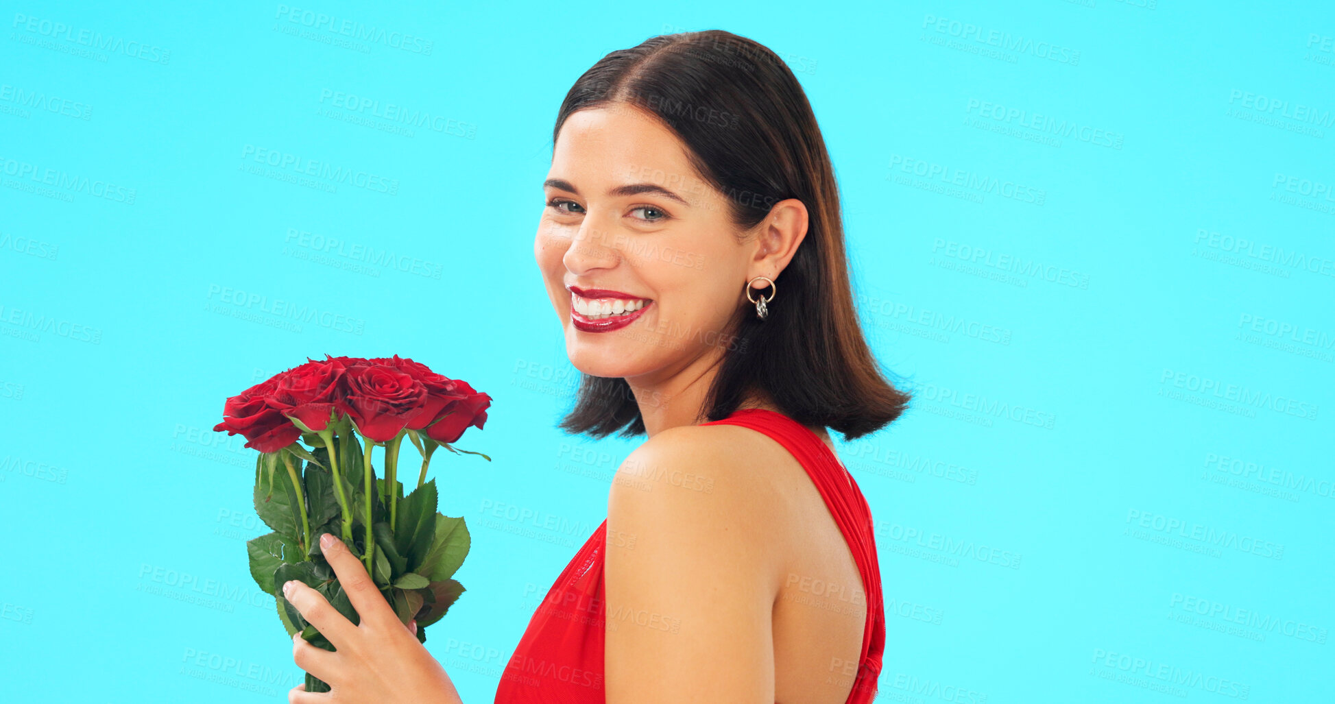 Buy stock photo Face, woman and rose bouquet in blue studio background, fresh flowers and floral for romantic gesture, mockup and isolated. Portrait, smiling and love with gift, present and valentines day romance