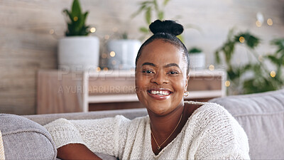 Relax, happy and smile with black woman on sofa for satisfaction, free time and weekend. Happiness, positive and confident with portrait of female in living room at home for calm, carefree and lounge
