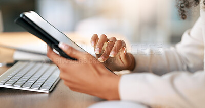 Interior designer scrolling on digital tablet, planning and choosing variety of decoration designs for a new property on real estate market. Closeup of decorator searching through ideas on technology