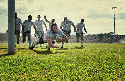 Buy stock photo Sports, men rugby team on green field and playing with a ball. Teammates with fitness or activity outdoors, collaboration or teamwork and happy or excited people celebrate a player score a try
