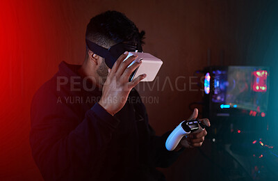 Buy stock photo Man in dark room, gaming and VR goggles and controller, online streaming with video games and metaverse. Digital world, male streamer and future technology, games and virtual reality experience