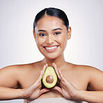 Happy woman, portrait and avocado in natural beauty, skincare or beauty cosmetics against a white studio background. Female person smile and fruit or vegetable in healthy nutrition, fibre or wellness