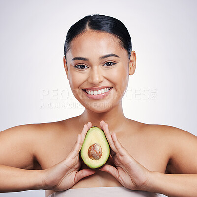 Buy stock photo Happy woman, portrait and avocado in natural beauty, skincare or cosmetics against a white studio background. Face of female person smile, fruit or vegetable in healthy nutrition, fiber or wellness