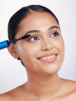 Buy stock photo Mascara, makeup for lashes and beauty with woman and face, eyelash extension isolated on studio background. Female model smile, cosmetics brush and skin glow with cosmetic product and cosmetology