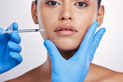 Buy stock photo Woman, needle and studio portrait for lips, surgery or cosmetics for skin, collagen or face by white background. Girl, cosmetic surgeon and filler for mouth, syringe or hands for beauty with skincare