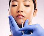 Lips injection, skincare and woman with plastic surgery in studio isolated on a white background. Cosmetics, syringe and female model with lip filler for dermatology, facelift treatment and beauty.