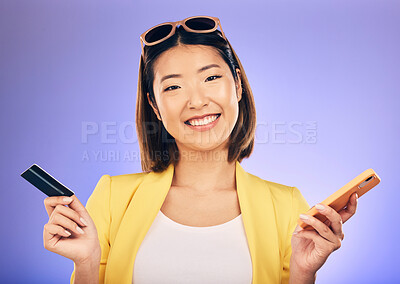 Buy stock photo Phone, credit card and portrait of a woman in a studio for online shopping with a positive mindset. Happy, smile and Asian female model with internet banking for paying bills by a purple background.