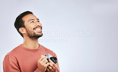 Buy stock photo Man with camera, photography and view with creativity, mockup space and art isolated on studio background. Happy male photographer, creative with artistic person smile and taking pictures with gadget