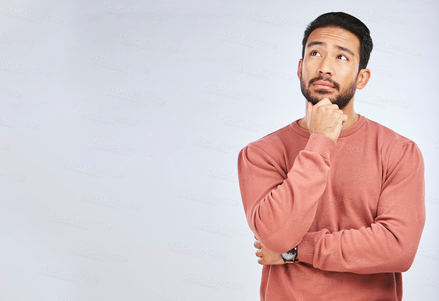 Buy stock photo Man, thinking and idea mockup in studio or planning, decision and choice with white background. Asian male, model and curious face with doubt, questions or confused guy try to remember with space
