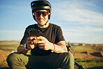 Biker, outdoor and man with a smartphone, typing and connection for social media, network and communication. Male person, cyclist or guy with a cellphone, mobile app and texting with sms and chatting