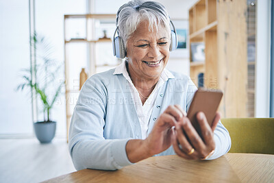Buy stock photo Senior woman, phone and music headphones with a smile while listening to audio, radio or podcast. Elderly female person in a house with a smartphone for streaming online, mobile app and relax 