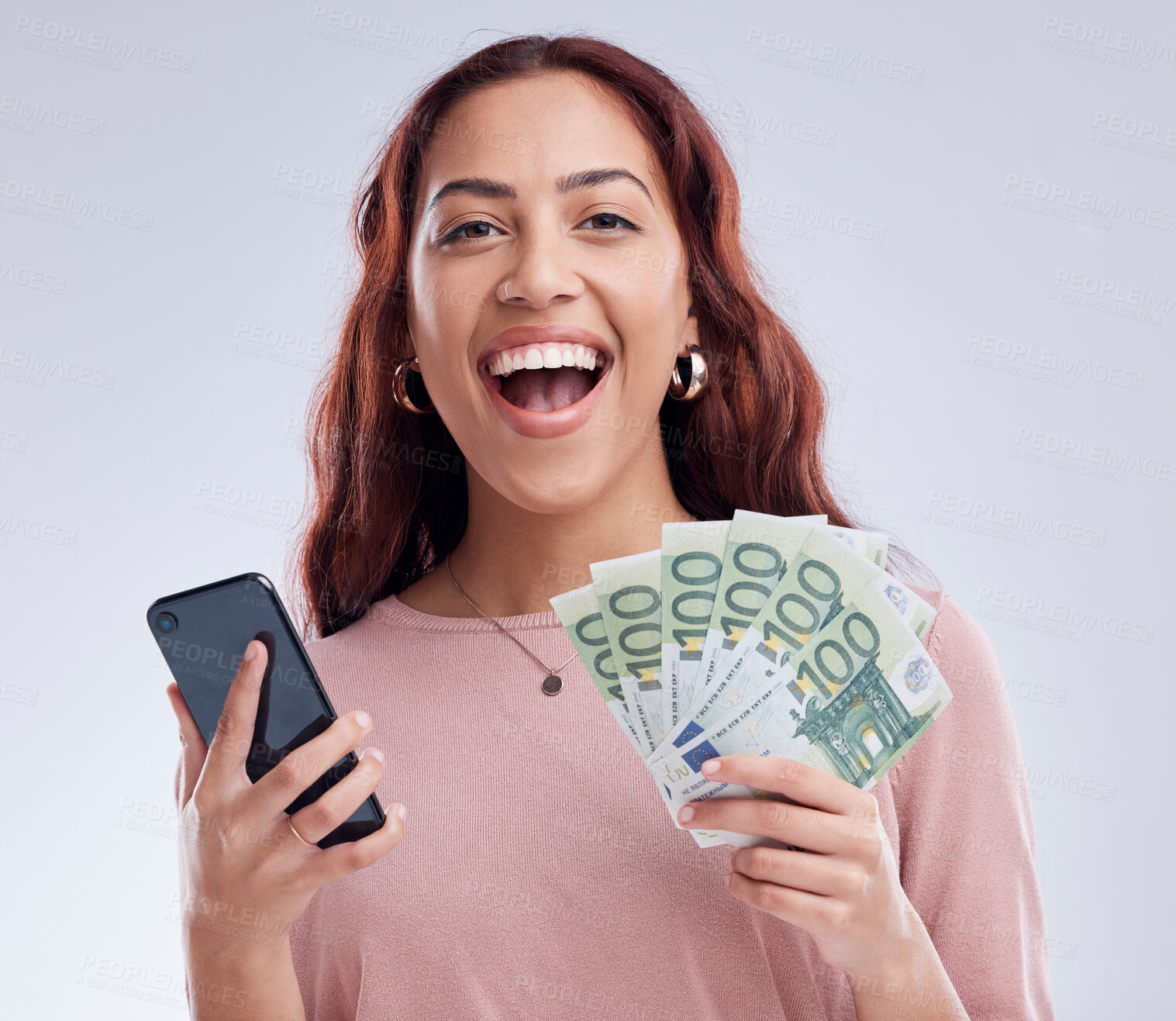 Buy stock photo Woman, money and phone in studio portrait, winning and happy with online gambling by white background. Excited girl, smartphone or cash fan with smile for fintech app, digital casino or crypto profit