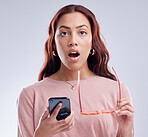 Portrait, connection and woman with a smartphone, surprise and communication against a studio background. Face, female person or model with shock, cellphone and mobile app with network and connection