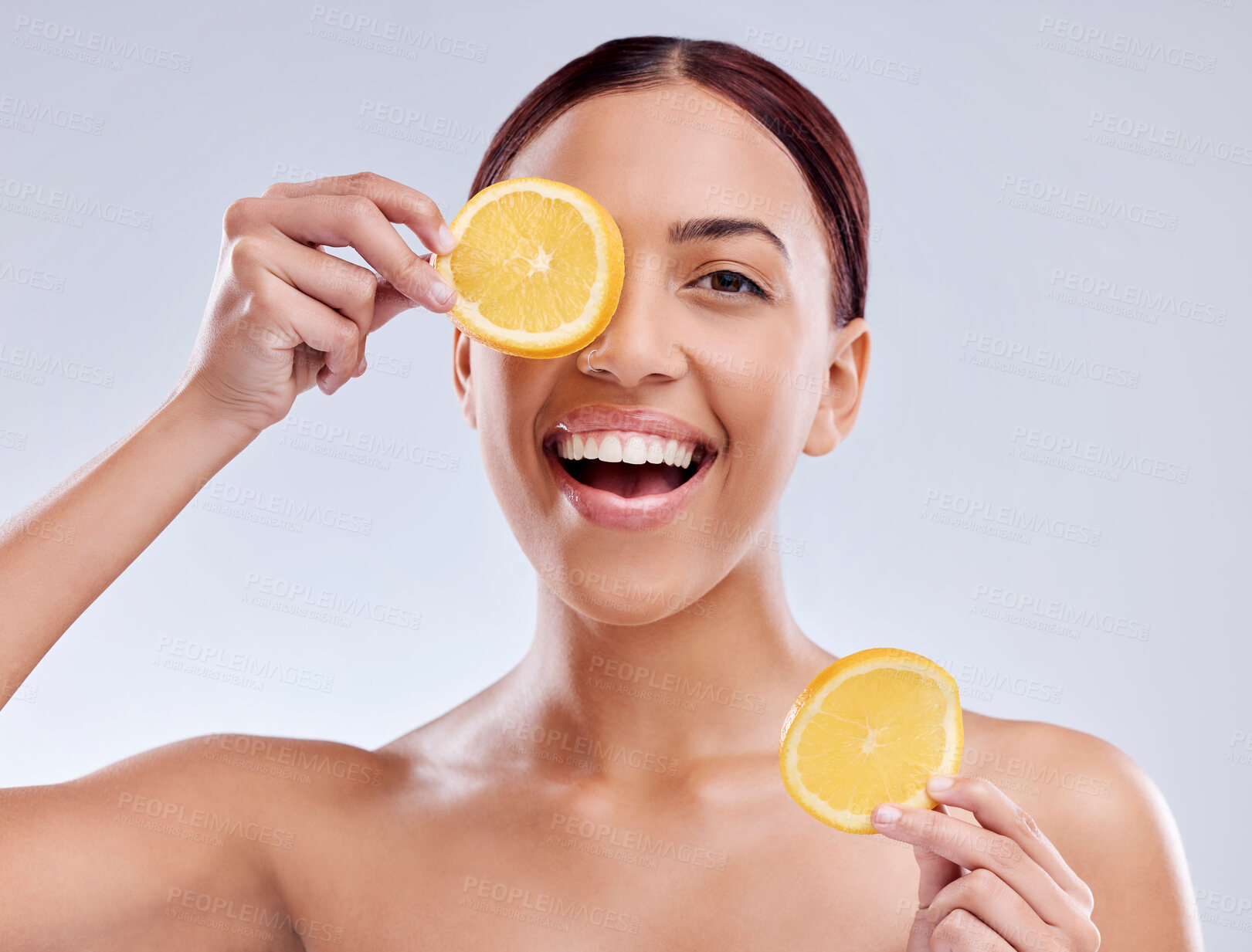 Buy stock photo Skincare, portrait or happy woman with orange or natural facial with citrus or vitamin c for wellness. Studio background, smile or healthy girl smiling with organic fruits for dermatology beauty 