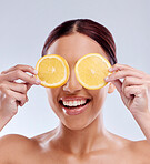 Skincare, mockup or happy girl with orange as natural facial with citrus or vitamin c for wellness. Studio background, smile or healthy female model smiling with organic fruits for dermatology beauty